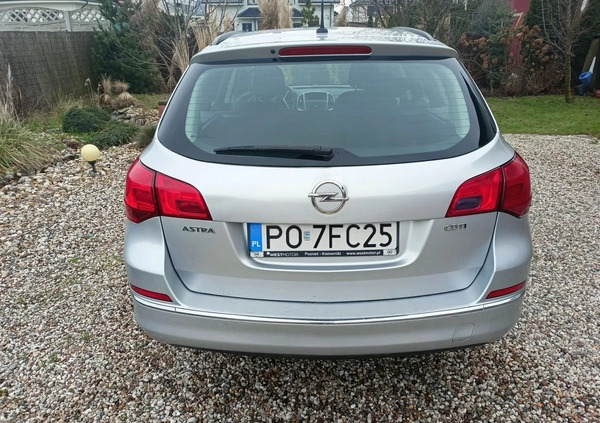 Opel Astra cena 24000 przebieg: 184000, rok produkcji 2014 z Poznań małe 46